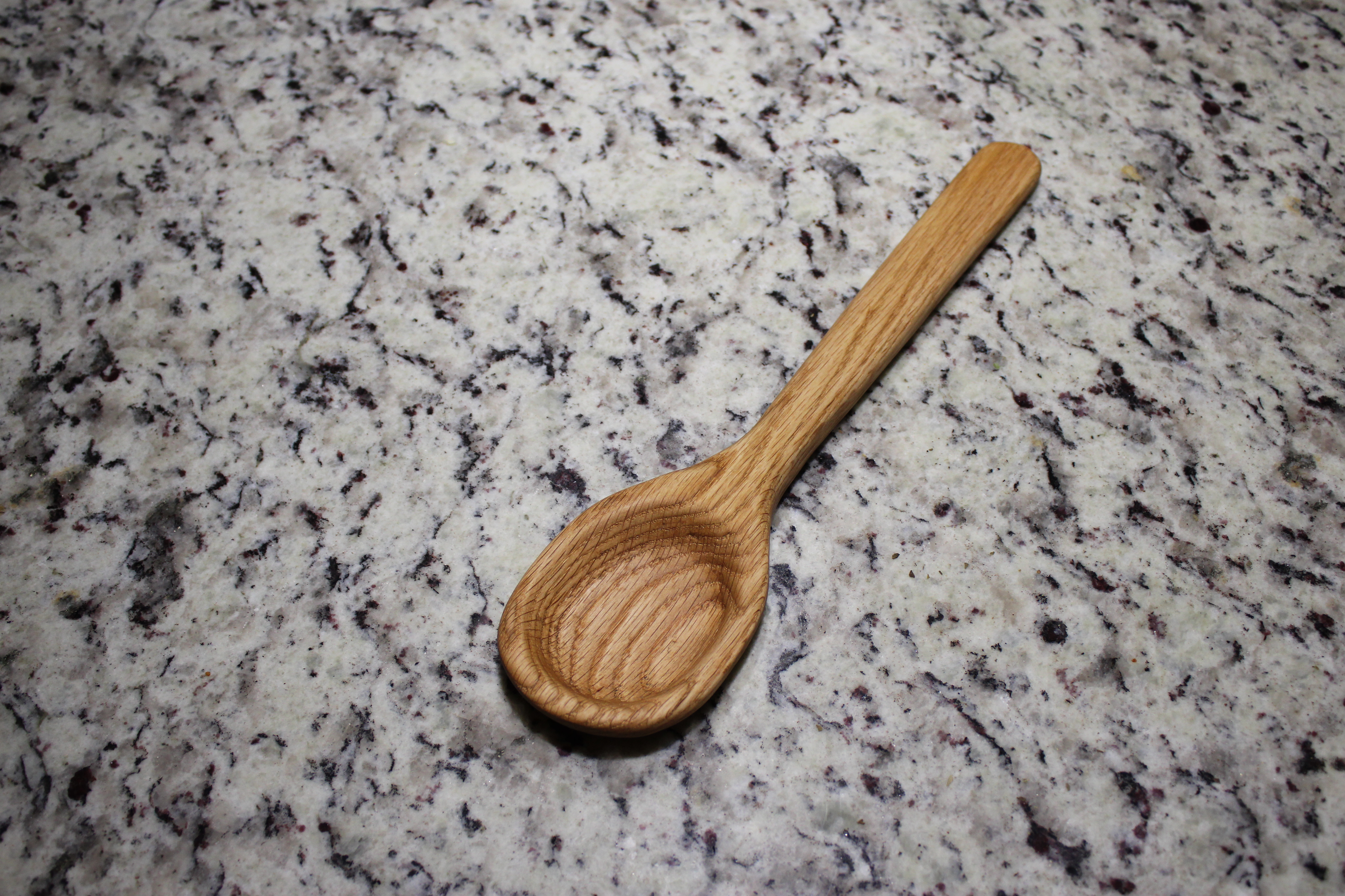 Completely carved wooden spoon